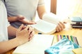 Two students reading from books in library at the university. Royalty Free Stock Photo