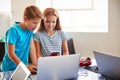 Two Students In After School Computer Coding Class Learning To Program Robot Vehicle Royalty Free Stock Photo