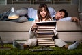 The two students studying late preparing for exams Royalty Free Stock Photo