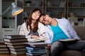 The two students studying late preparing for exams Royalty Free Stock Photo