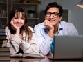 Two students studying late preparing for exams Royalty Free Stock Photo