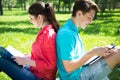 Two students studying in park Royalty Free Stock Photo