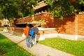 Two students walk past the Robie House,