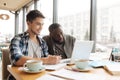 Two students working on laptop together Royalty Free Stock Photo