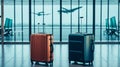 Two stylish suitcases standing in empty airport Royalty Free Stock Photo