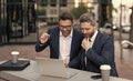 two successful businessmen trading online. businessmen trading online outdoor. Royalty Free Stock Photo