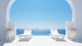 two sun beds on white terrace with arch. traditional mediterranean architecture under blue clear sky