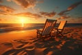 Two sun loungers on the beach stand on the sand