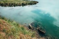 Two sunken wooden fisherman`s boats in the river water at the N Royalty Free Stock Photo