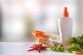 Two sunscreen spray on shells on glass table