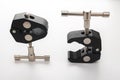 Two Super Crab Clamp for DSLR or mirrorless Camera. 1 4 and 3 8 inch thread holes. Ideal company for magic arms, DSLR rig, studio Royalty Free Stock Photo