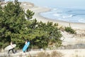 Two surfers at Cape Henlopen State Park, Delaware Royalty Free Stock Photo