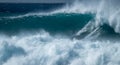 Two surfers sharing the giant wave at the famous Waimea Bay