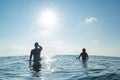 Two surfers wait the wave Royalty Free Stock Photo