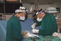 Two surgeons operating