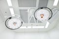 Two surgical lamps in operation room Royalty Free Stock Photo