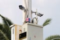 Two surveillance cameras on the street. Royalty Free Stock Photo