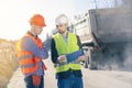 Two Surveyors Inspect Building Construction Site. Group of construction engineers on a building plot