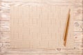 Two sushi chopsticks with empty brown bamboo mat or wood plate on brown wooden Background Top view with copy space. empty asian Royalty Free Stock Photo