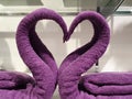 Two swans made of towels forming heart Royalty Free Stock Photo