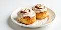 Two sweet cinnamon rolls with creamy icing on a plate. Generative AI Royalty Free Stock Photo