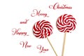 Two sweet lollipop with red, white spiral stripes colors on wooden stick isolated on white background. Royalty Free Stock Photo