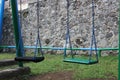 Two swings in a playground