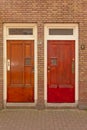 Two symmetrical wooden doors in new objectivity style Royalty Free Stock Photo