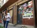 Two Syrian girls walking past an internet cafe on the Street Called Straight, Damascus, Syria.