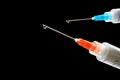 two syring on black background Royalty Free Stock Photo