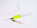 Two syringes and broken ampules Royalty Free Stock Photo