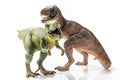 Two T-rex plastic figurines Royalty Free Stock Photo