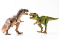 Two T-rex plastic figurines Royalty Free Stock Photo