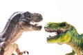 Two T-rex plastic figurines Royalty Free Stock Photo