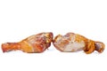 Two tainted smoked chicken legs on a white Royalty Free Stock Photo