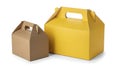 Two takeout boxes, one brown, one yellow Royalty Free Stock Photo