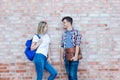 Two talking german male and female students Royalty Free Stock Photo