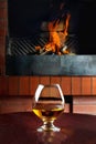 Two tanks of cognac on the old brick fireplace Royalty Free Stock Photo