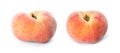 Two tasty flat peaches on white background Royalty Free Stock Photo