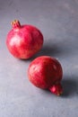 Two Tasty Fresh Ripe Pomegranate Pink Background Vertical Above