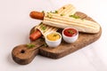 Two tasty grilled french hot dog with mustard and ketchup Royalty Free Stock Photo