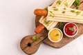 Two tasty grilled french hot dog with mustard and ketchup Royalty Free Stock Photo
