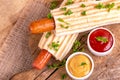 Two tasty grilled french hot dog with mustard and ketchup Royalty Free Stock Photo