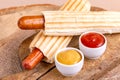 Two tasty grilled french hot dog with mustard and ketchup Royalty Free Stock Photo