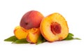 Two tasty juicy peaches with a half and slices  on a white background Royalty Free Stock Photo