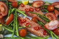 Two tasty pieces of salmon with green asparagus