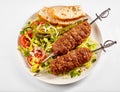 Two tasty spicy Turkish adana lamb kebabs