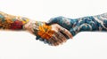 Two tattooed hands shaking, symbolizing unity and diversity with colorful designs Royalty Free Stock Photo