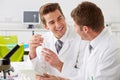 Two Technicians Working In Laboratory Royalty Free Stock Photo