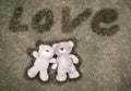 Two teddy bears laying down for Valentine background Royalty Free Stock Photo